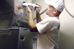 A service technician installs an RGF REME system. (Photo courtesy of RGF Environmental Group.)