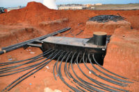 Inside the underground vault, each of the 24 geothermal loop circuits connect to the balancing valves, which balance water flow.