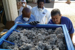 Magic Touch Mechanical has been offering insulation services since 2007. Here, the insulation team prepares the insulation machine hopper settings at the start of a project.