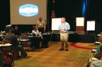 Roger Fouche, owner, Schaal Heating & Cooling, Des Moines, Iowa, leads the Member Sharing Roundtable at the QSC Power Meeting XL in Fort Worth, Texas.