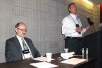 A presentation on ammonia refrigeration systems pressure relief venting is given by William Greulich of Kensington Consulting. Seated is Brian Marriott, who moderated the Q&A portion of the presentation.