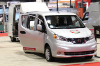 The Nissan booth showcased a variety of vehicles within its commercial fleet.