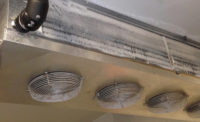 FIGURE 1: An evaporator in a walk-in cooler has frost blocking much of the airflow from entering the coil.