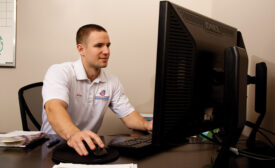 Adam Saunders, sales manager, Air Quality Dunrite, Toronto, reviews an order prior to dispatching a team of technicians.