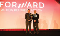 Johnstone Supply won the 2015 Big Man on Planet award from the Thermostat Recycling Corp. (TRC). CEO DeWight Wallace (left) accepts the trophy from TRCÃ¢â¬â¢s Mark Tibbetts.