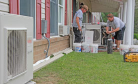 Installers Edward Gavenus (left) and James Walsh (right)