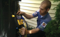 Bryan Jones, an installer at Fire and Ice Heating and Air Conditioning, Columbus, Ohio, ensures the charge is correct. - ACHR