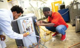 Two apprentice students at Santa Fe College’s Heating & Air Conditioning Apprenticeship certificate program.