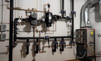 A geothermal mechanical room displays a selection of geothermal technology for contractors to learn, understand, and convey the benefits of to their customers.