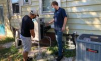 Alex Peterson, 911 Heating & Air owner (right), has found success in sharing info with customers in simple, understandable terms.