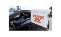 A successful applicant at the Dec. 10 drive-through hiring event at Frank Gay Services celebrates his hiring.