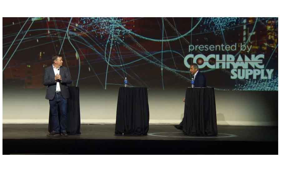 Scott Cochrane, president and CEO of Cochrane Supply, (left), and Jim Young, founder and CEO, Realcomm (right).
