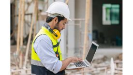 Construction Worker with Laptop