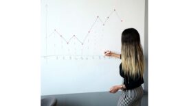 Woman at Marker Board