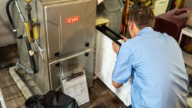 Technician Servicing Bryant Unit