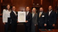 Mayor John Whitmire presents proclamation to Daikin's Satoru Akama.JPG