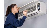 Woman and HVAC Unit