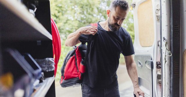 HVAC Contractor Entering Van