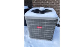 snow on HVAC equipment