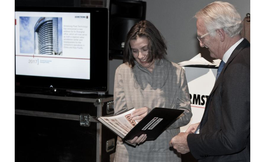 Charles Armstrong, chairman of Armstrong Fluid Technology (right) donates a collection of historical photos