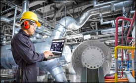 man with hard hat working on hvac equipment